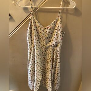 Sleeveless flowery dress size M. Knee length